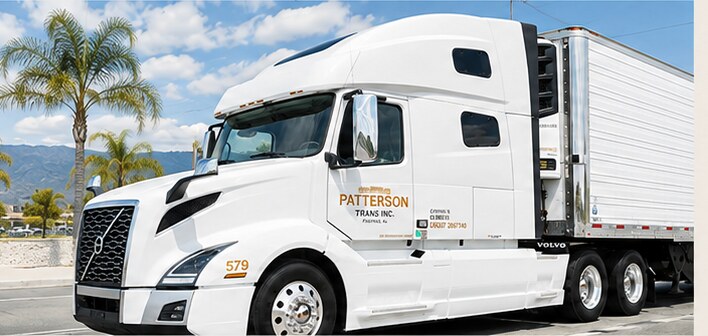Patterson Trans Inc. refrigerated truck 579 in daylight